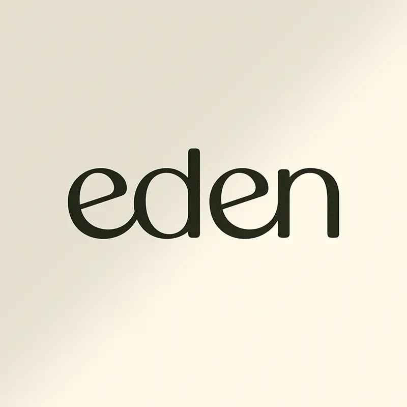 Eden wordmark in dark olive lowercase letters on a soft cream background.