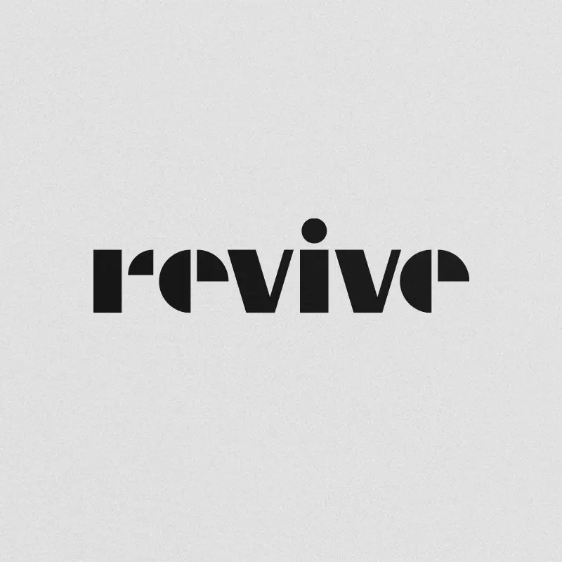 Revive wordmark in bold black geometric lowercase letters on a light gray textured background.
